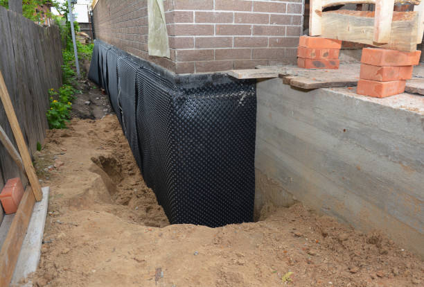 SJ Waterproofing Pros technician performing targeted Sump Pump Installation assessment in Mount Vernon, GA